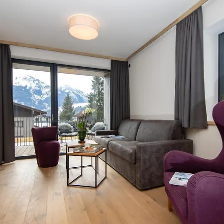 Lägenhetshotell Emma Deluxe Mit Beheizten Aussenpool Direkt Beim Skibus Piesendorf